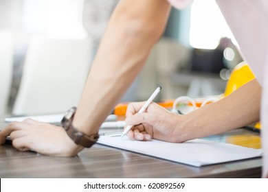 Asian business men are analyzing jobs - Shutterstock ID 620892569
