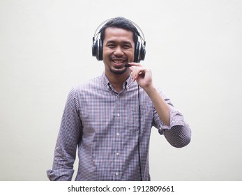 Asian Business Men Smiling To The Camera While Talking Using Headset Isolated On White