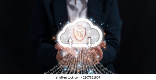 Asian Business people , Cloud security lock means the protection of important devices that are downloaded and uploaded on the cloud to be a privacy database. The concept of data theft prevention. - Shutterstock ID 2107851809