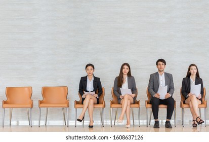 Asian Business People Are Waiting For A Job Interview.