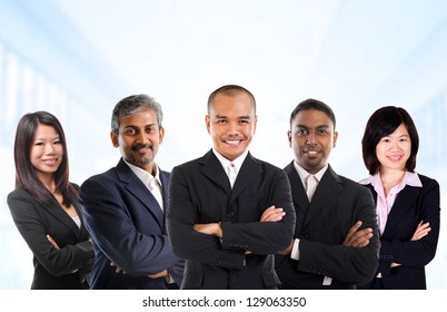 Asian Business Person In Multiracial. Diversity Business People Form By Different Races, Indian, Malay, Indonesian, Chinese Standing In Office Environment.