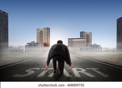 Asian Business Person Ready To Run Toward The City. Business Opportunity Concept