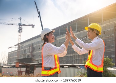 Asian business team worker engineer success on site construction