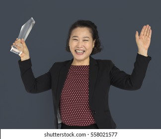 Asian Business Woman Award Smiling - Powered by Shutterstock