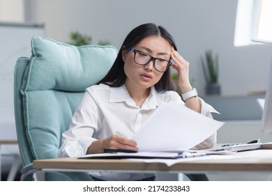 Asian Business Woman Behind Paper Work, Tired And Frustrated, Working In Office, Female Employee In Bra Looking At Documents And Financial Reports.