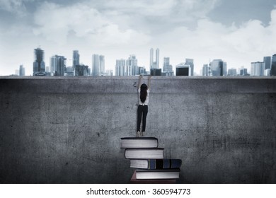 Asian Business Woman Climbing Book. Higher Education Concept