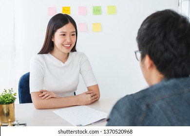 Asian Business Woman Discussing/job Interview With Colleauge/boss For Business Meeting