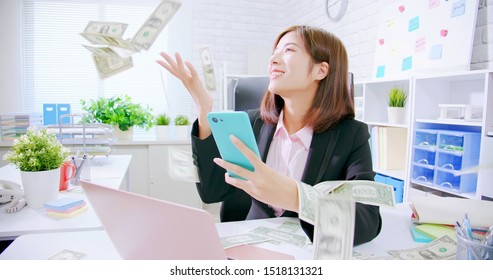 Asian Business Woman Excited With Raining Money