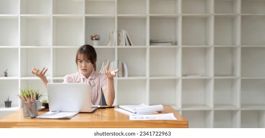 Asian business woman got stressed at work during in the office room, stressed face while working - Shutterstock ID 2341722963
