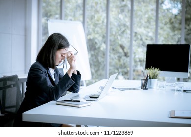 Asian Business Woman Headache Stressed Because Of Work Mistake Problems About Profit Losses To Be Risk For Fired From Her Job