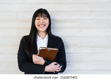 Asian Business Woman Holding Smart Tablet Outside Office - Youth Entrepreneurship Concept