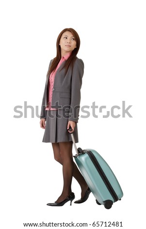 Asian business woman holding suitcase to travel isolated over white.