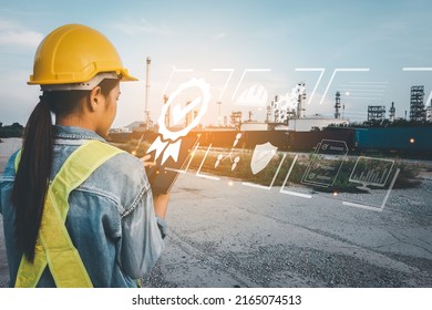 Asian Business Woman with safety hard hat with touches icons Show visual Screen sign of the top service Quality assurance, Guarantee, Standards, ISO certification and standardization concept. - Shutterstock ID 2165074513