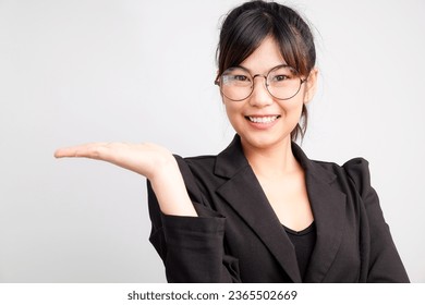 Asian business woman show welcome empty hand on white background copyspace ad use - Shutterstock ID 2365502669