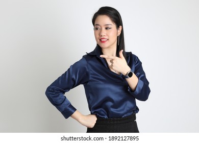 The Asian Business Woman Standing On The White Background.