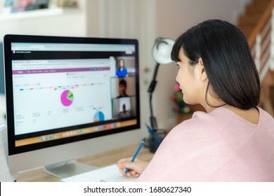 Asian business woman talking to her colleagues about plan in video conference. Multiethnic business team using computer for a online meeting in video call. Group of people smart working from home.
 - Shutterstock ID 1680627340