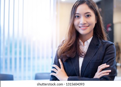 Asian business women and group using notebook for meeting and business women smiling happy for working 