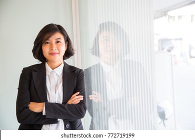 Asian Business Women ,smart People In The Office.