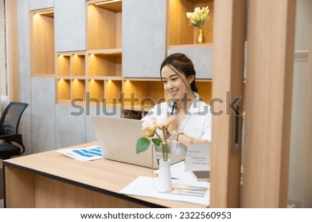Asian business working woman work online job on laptop computer at smallbusiness home office. Work from home
