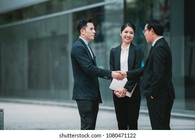 Asian Businessman Handshake And Deal Business With Professional Employee  - Business Teamwork Meeting And Discussion Together,Success And Happiness Are Connected Community Company