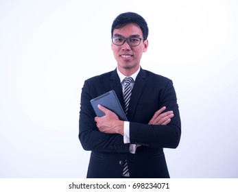 Asian Businessman Holding A Tablet Or Ipad On White Background