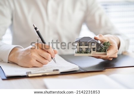 Asian businessman making a real estate contract