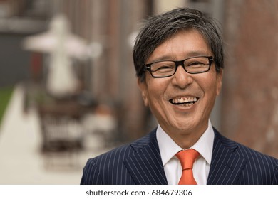 Asian Businessman In Suit Smile Happy Face Portrait