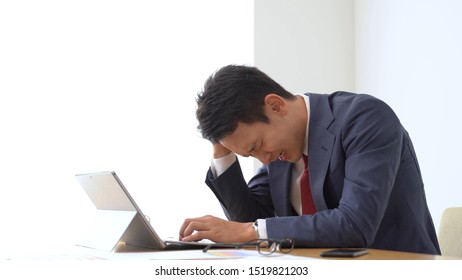 asian businessman working in office