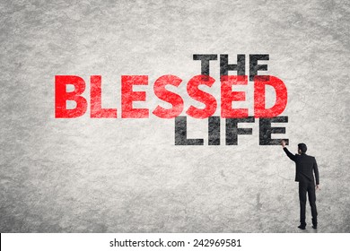 Asian Businessman Write Text On Wall, The Blessed Life