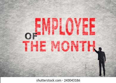 Asian Businessman Write Text On Wall, Employee Of The Month