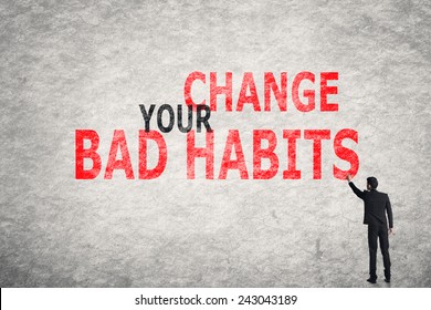 Asian Businessman Write Text On Wall, Change Your Bad Habits