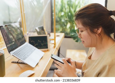 Asian Businesswoman, Female Trader, Investor Using Smartphone, Laptop, Tablet For Stock Market, Bitcoin Cryptocurrency Trading, Money Investing On Online Trading Platform. Woman Trader Trading Concept