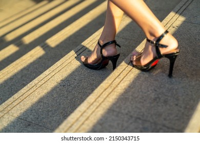  Asian Businesswoman Office Worker In Working Dress And High Heels Walking Down The Stairs At Railway Station Urban City Street . Business Woman Go To Working At Office Center In Morning Rush Hour