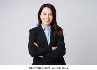 Asian businesswoman portrait, isolated on white background