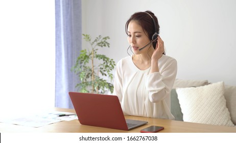  Asian Businesswoman Remote Working In Home