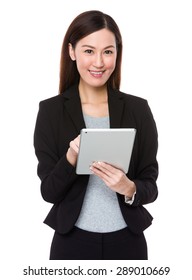 Asian businesswoman use of digital tablet - Shutterstock ID 289010669