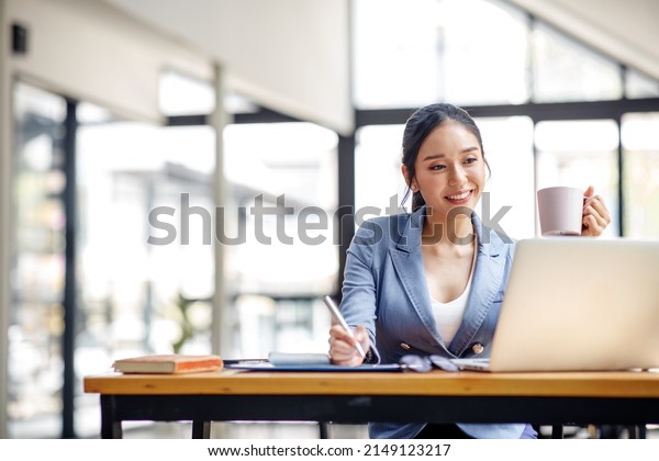 Asian Businesswoman Using Laptop Computer Working Stock Photo ...