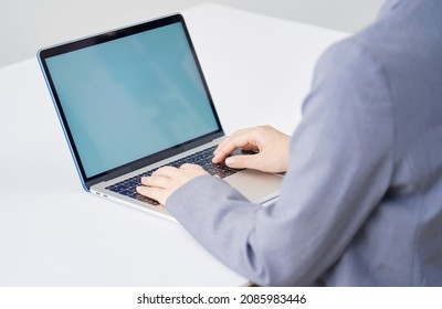 Asian Businesswoman Using The Laptop, No Face