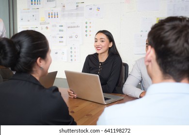 Asian Businesswoman Working With Business Team, Woman Leader Concept,  20-30 Year Old.