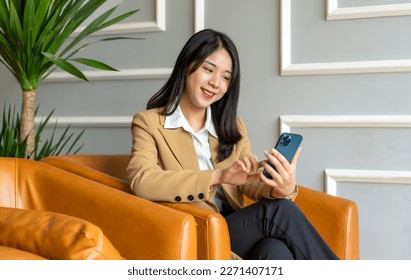 Asian businesswoman working in a cafe
 - Powered by Shutterstock