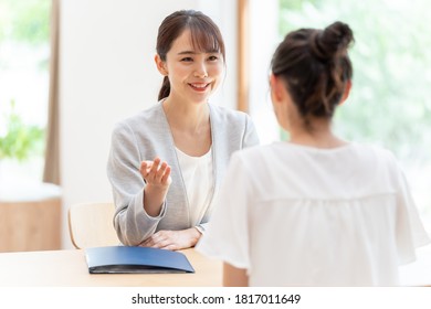 Asian Businesswomen Meeting At Living Room