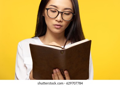 Asian Bussines Woman On Yellow Background                               