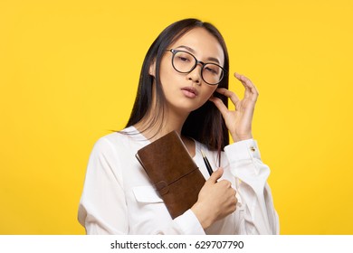 Asian Bussines Woman On Yellow Background                               