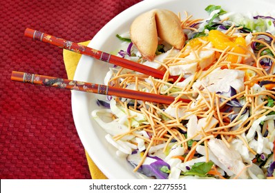 Asian Chicken Salad With Chopsticks And A Fortune Cookie.