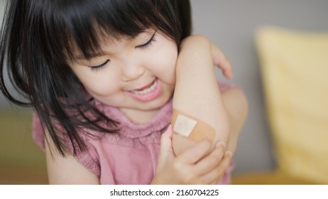 Asian Child With Arm Injury