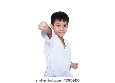 Asian child athletes martial art taekwondo training, isolated on white background. Cute boy with white belt in karate position, studio shot.