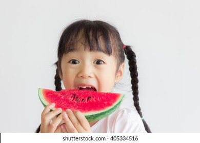 Asian Child Eat Watermelon