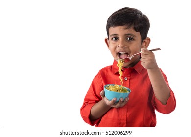 Asian Child Eating Delicious Noodle, Indian Kid Eating Noodles With Fork On White Background