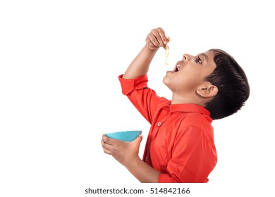 Asian Child Eating Delicious Noodle, Indian Kid Eating Noodles On White Background