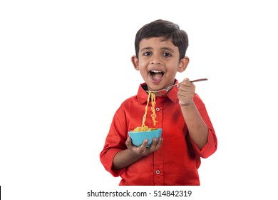 Asian Child Eating Delicious Noodle, Indian Kid Eating Noodles With Fork On White Background